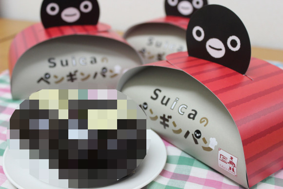 The adorable Suica penguin bread —  Too cute to eat but too good not to