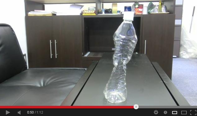 How to crush a plastic bottle without touching it