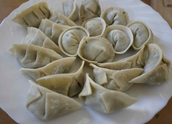 Three nations come together in friendship to share their dumpling wrapping skills