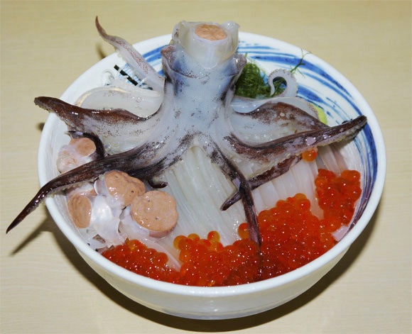 We try a rice bowl served with a still-moving squid