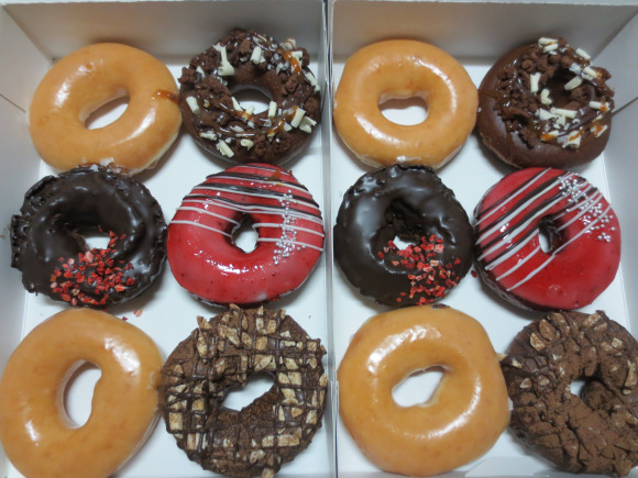We get ready for romance by eating Krispy Kreme’s limited edition Valentine’s Day donuts