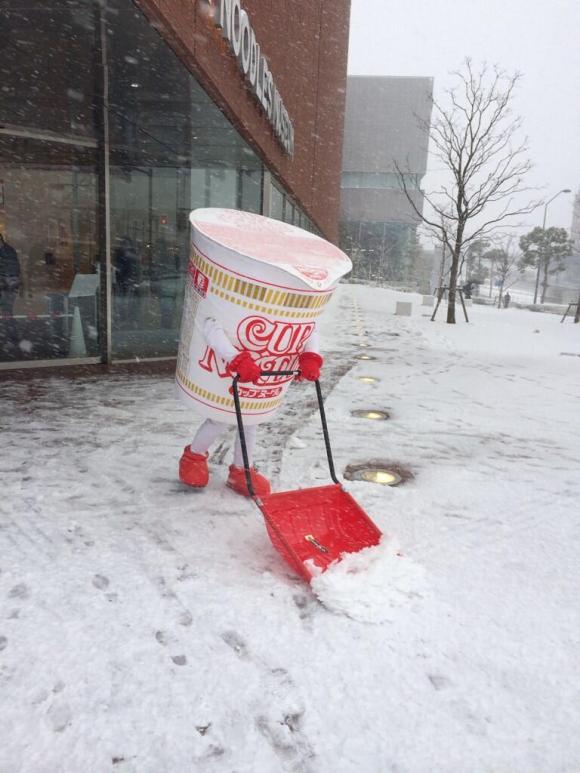 cup noodle shoveling snow