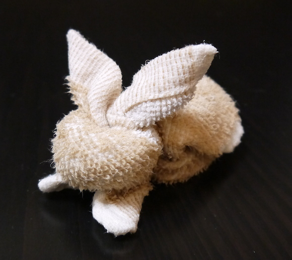 How to fold an adorable towel bunny while you wait for your meal