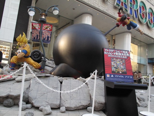 See life-size Dragon Ball & One Piece statues fight & turn Tokyo street into rubble
