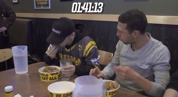 Champion competitive eater Kobayashi goes undercover to punk soccer team in wing eating contest