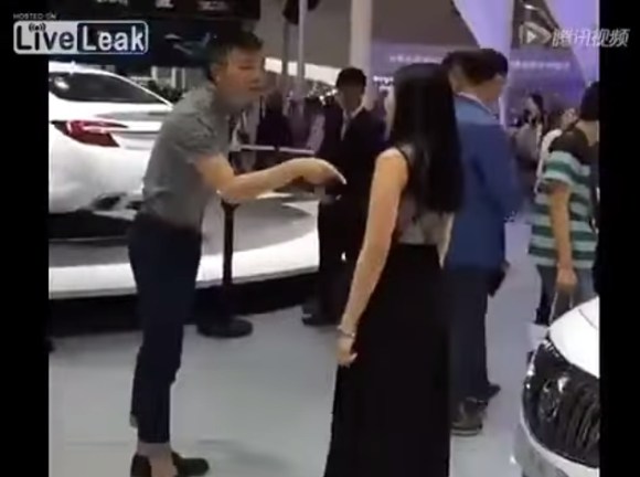 Woman wants man to buy white car for her at auto show - YouTube.clipular (4)