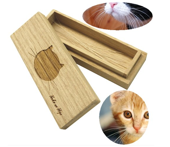 New for obsessive pet owners: A wooden box to keep your cat’s whiskers and teeth in!