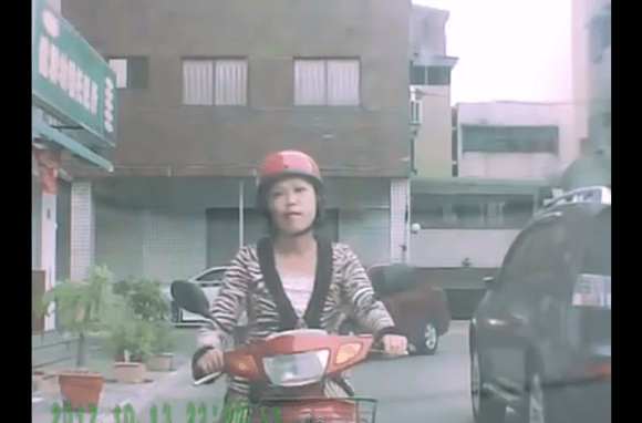 woman on scooter