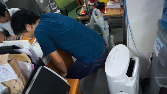 Our intrepid Japanese team tests out the air purifier at work…using flatulence