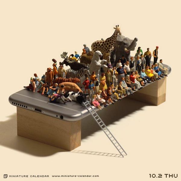 Miniature photographer enlists 100 tiny friends to try to bend his new
iPhone 6 Plus