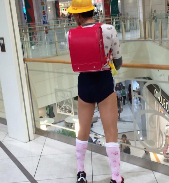 Somebody call mall security! Grown man dressed as little girl shows off for shoppers