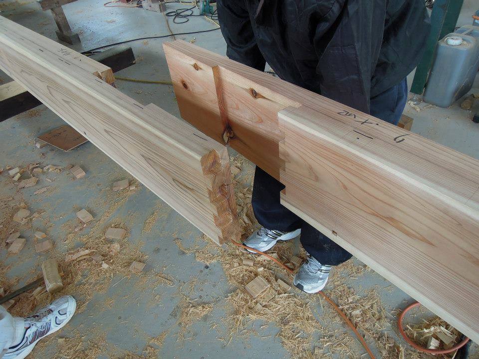 Japanese carpenters demonstrate traditional wooden joints and it’s