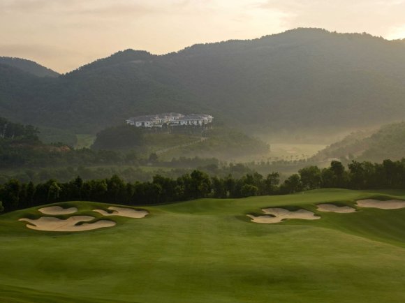 the-first-dongguan-course-was-designed-by-the-best-female-golfer-in-history-annika-sorest-it-has-lots-of-natural-terrain-dramatic-elevation-changes-and-mountains-in-the-background