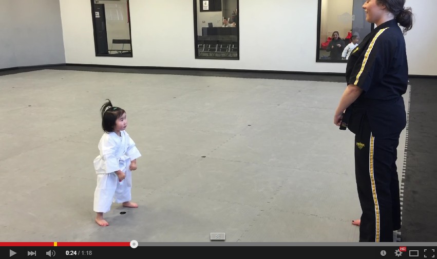 Three-year-old girl perfectly recites martial arts school's