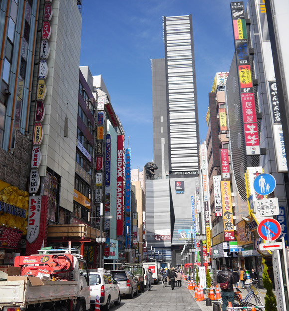 Godzilla appears in the Tokyo skyline atop new Shinjuku skyscraper ...