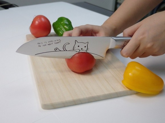 Satisfy all your slicing and dicing needs with this incredibly kawaii kitty kitchen knife
