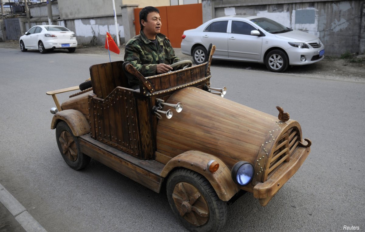 liu-fulong-from-the-shenyang-liaoning-province-created-a-wooden-electronic-vehicle-at-home-which-has-a-top-speed-of-30kmh