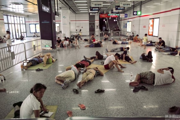 Chinese residents are parking themselves in subways and public spaces in an effort to keep cool