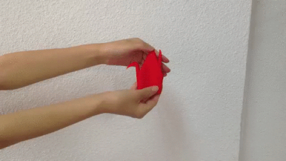Watch this magical cloth return to its origami form after being stretched out