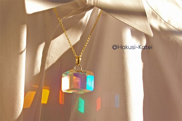 Clear cube necklace lets you carry all the colors of the rainbow
