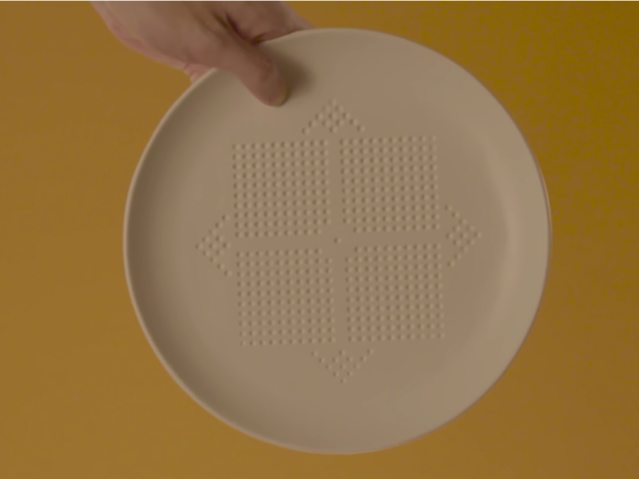 An ad agency created a dinner plate that cuts 30 calories from each meal