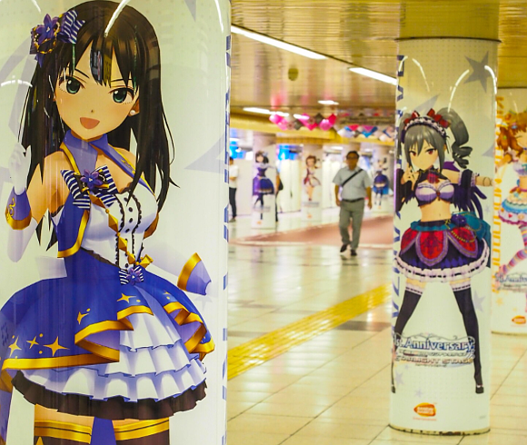 Japanese Idolmaster anime girls take over Shinjuku Station in Tokyo
