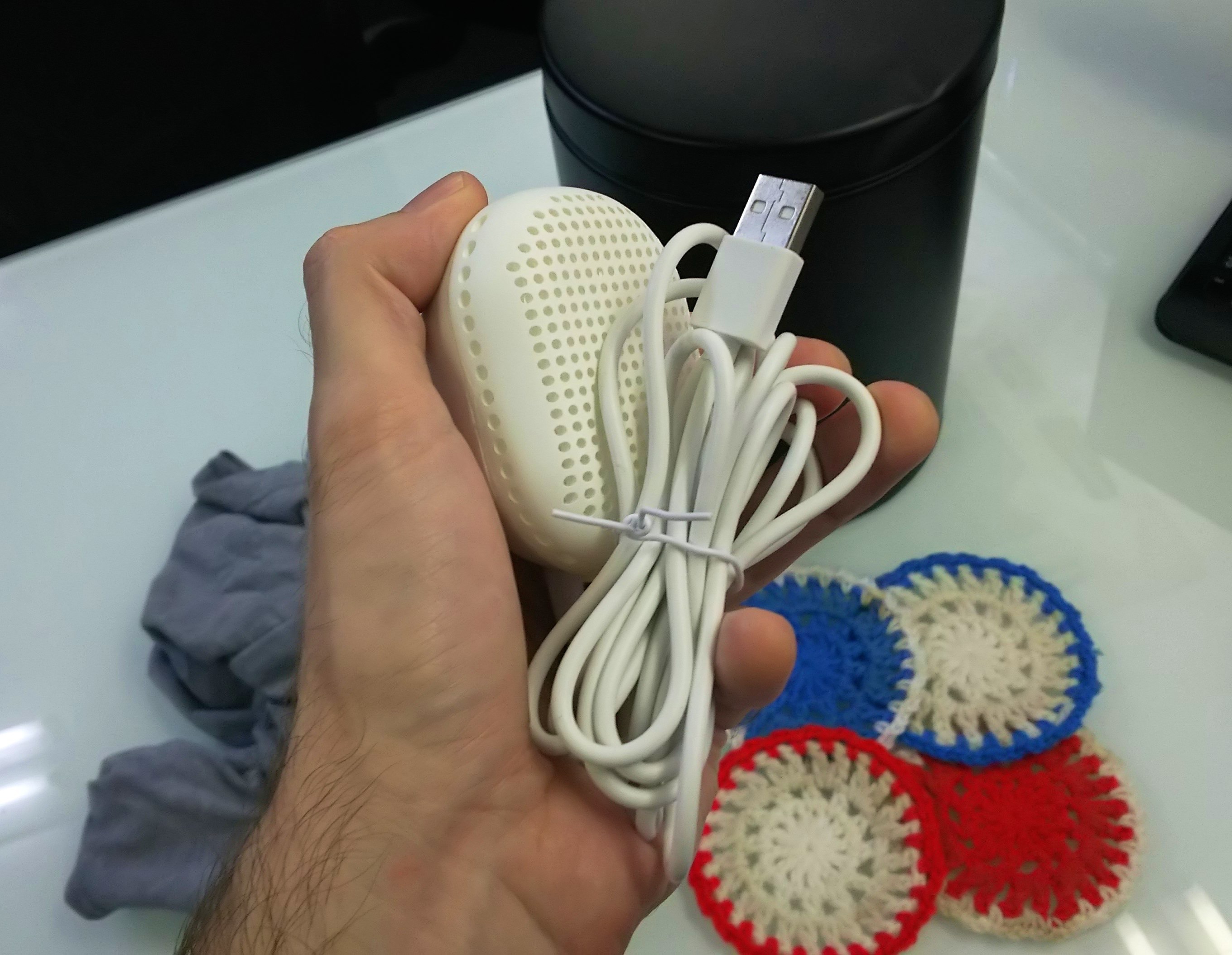 Doing a load of laundry in an office trash can with the pocketsized