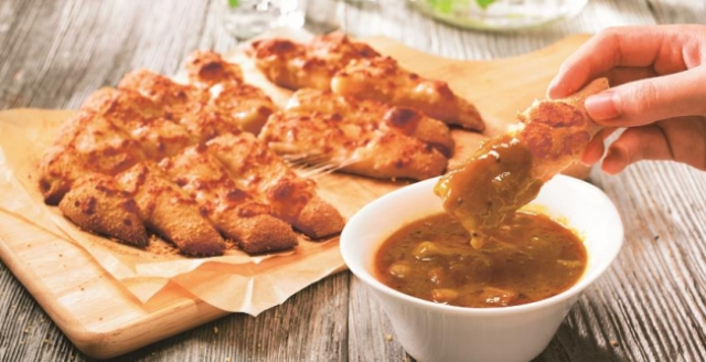 Domino’s Pizza Japan now sells curry to dip its pizza crust in, and we want it so bad