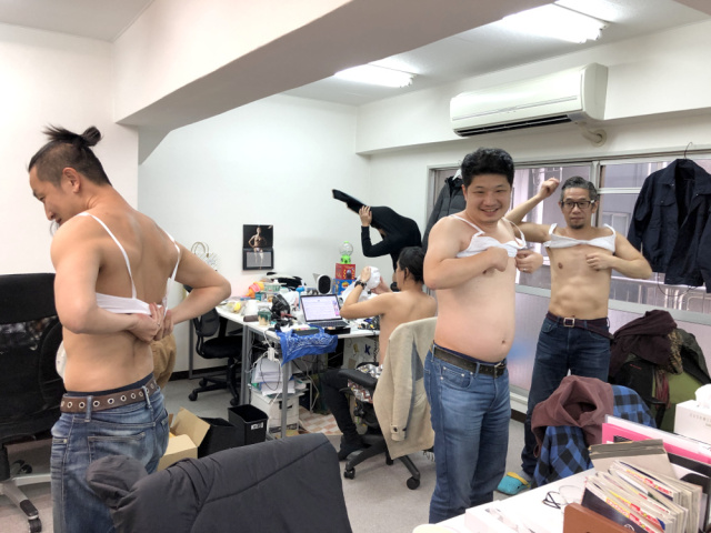 Everyone in the office wears a bra in search of the true meaning of  Brassiere Day