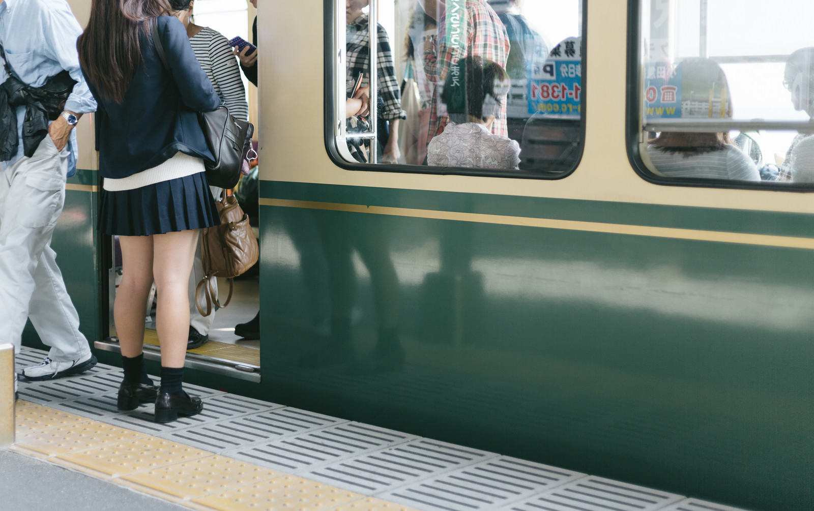 Japanese woman finds a depressing way to prevent train gropers from targeti...