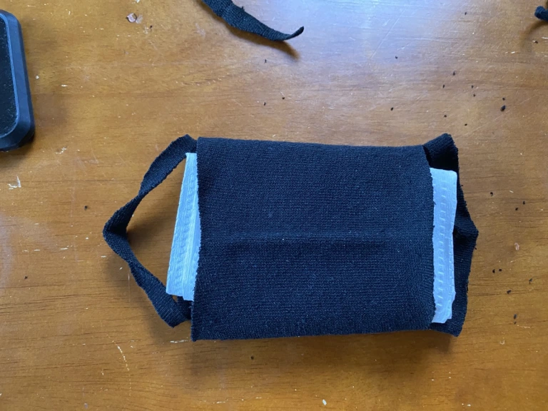 How to make a mask out of a sock in two minutes with no sewing skills