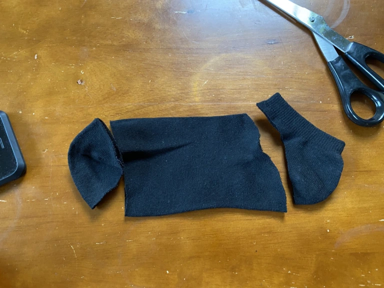How to make a mask out of a sock in two minutes with no sewing skills