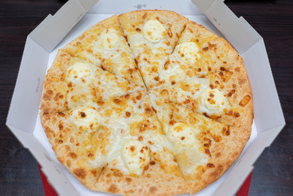 We tried Pizza Hut Japan’s limitededition pizza topped with…ice cream