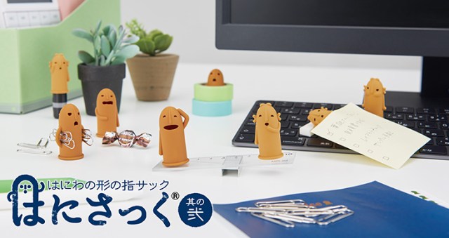 Protect your fingers with these adorable rubber thimbles based off ancient Japanese clay dolls