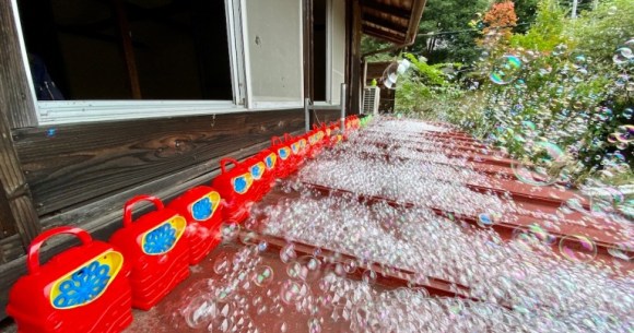44 bubble machines on the roof of a Japanese country house is our