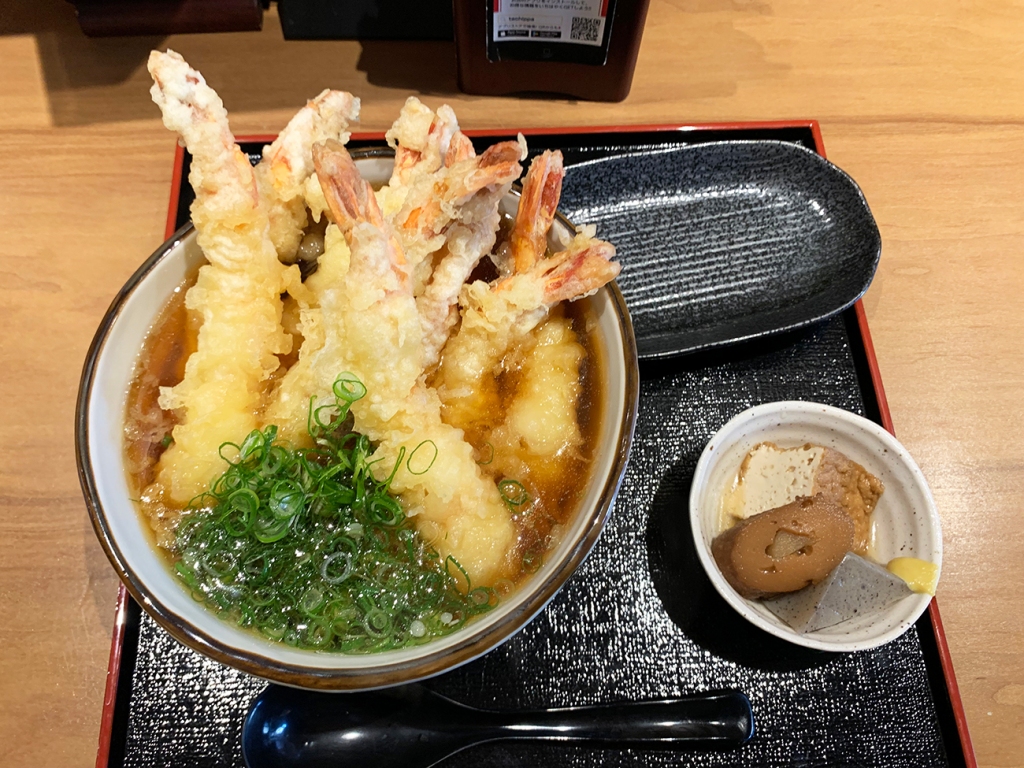 A delicious bowl of Osaka soba stuffed with tempura shrimp that’s also