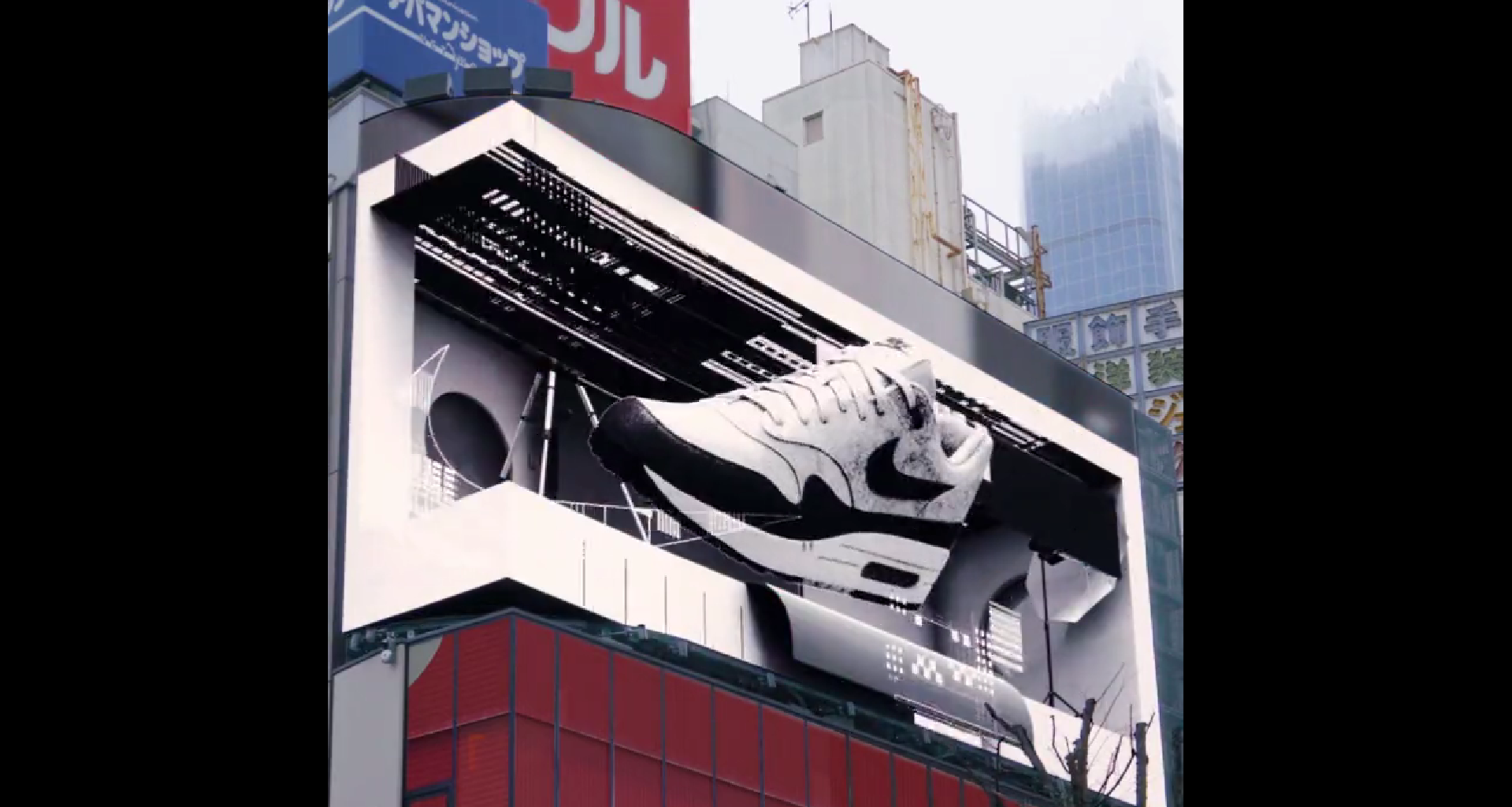 Nike takes over Cross Shinjuku Vision’s giant screen with 3D sneakers… and cat paws