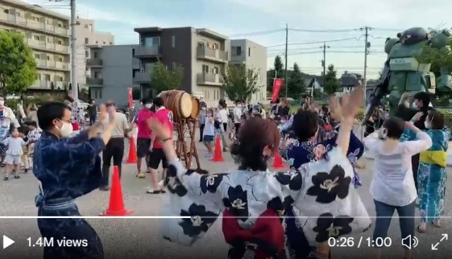 And now, a traditional Japanese bon dance, performed next to a life-size anime robot statue【Vid】