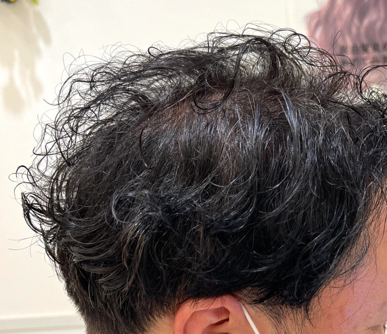 Does getting a perm help hide the thinning hair spots on your head? We
