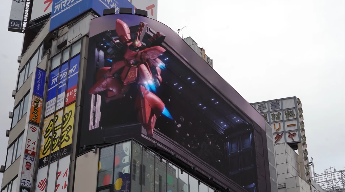 Clever trick gives Gundam duel on Tokyo's 3-D billboard some of its 