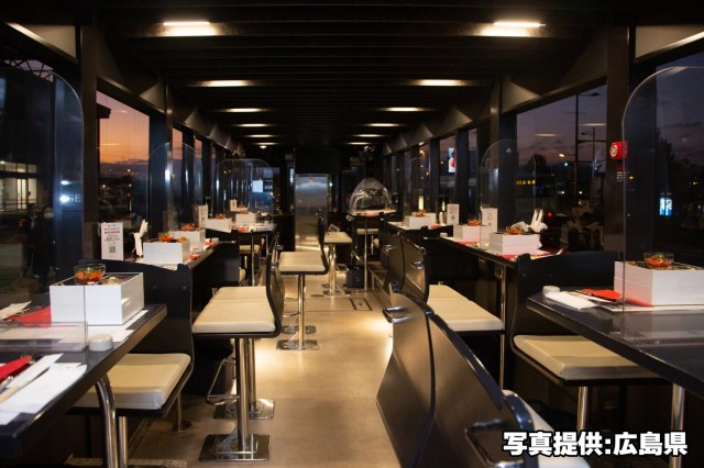 We travel across the city like royalty — Hiroshima streetcar turns into fancy, private dining area