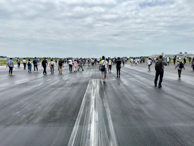We go to a festival on a Japanese Air Self-Defense Force base, walk on a runway, see cool planes