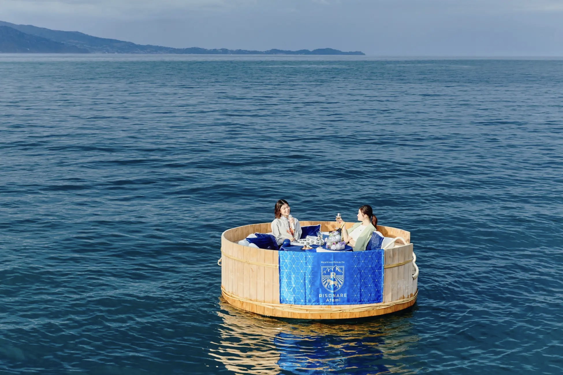 luxury-hotel-chain-offering-karaoke-in-a-large-tub-floating-on-the