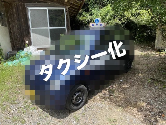 How to convert a cheap car into a Japanese taxi…with tape and a wild imagination