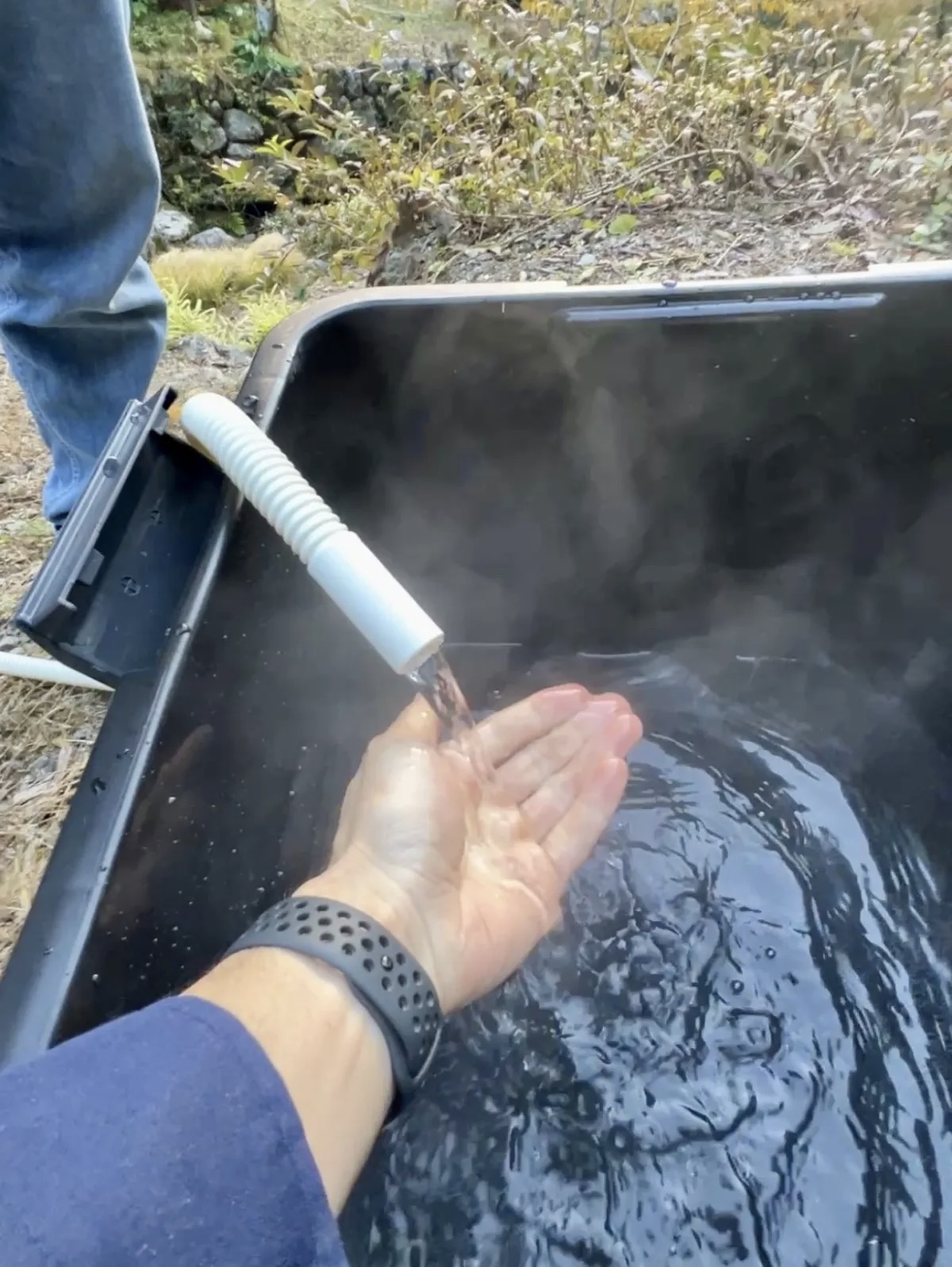 Setting up a campfireheated footbath at our cheap Japanese country