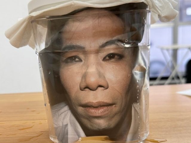 We try out the “head in a jar” prank, seen in a viral video, at the office