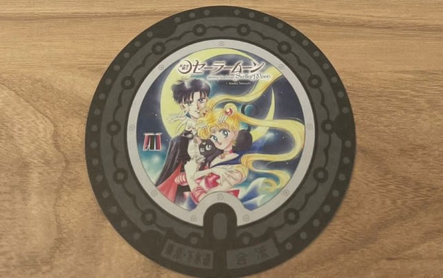 Beautiful Sailor Moon manhole cover coasters being given out for free by Tokyo tourist center