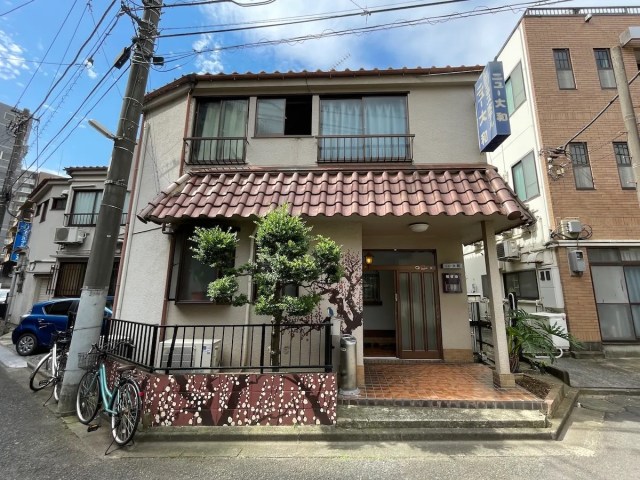 Japanese house is actually a cheap hotel where you can stay for US$24 a night