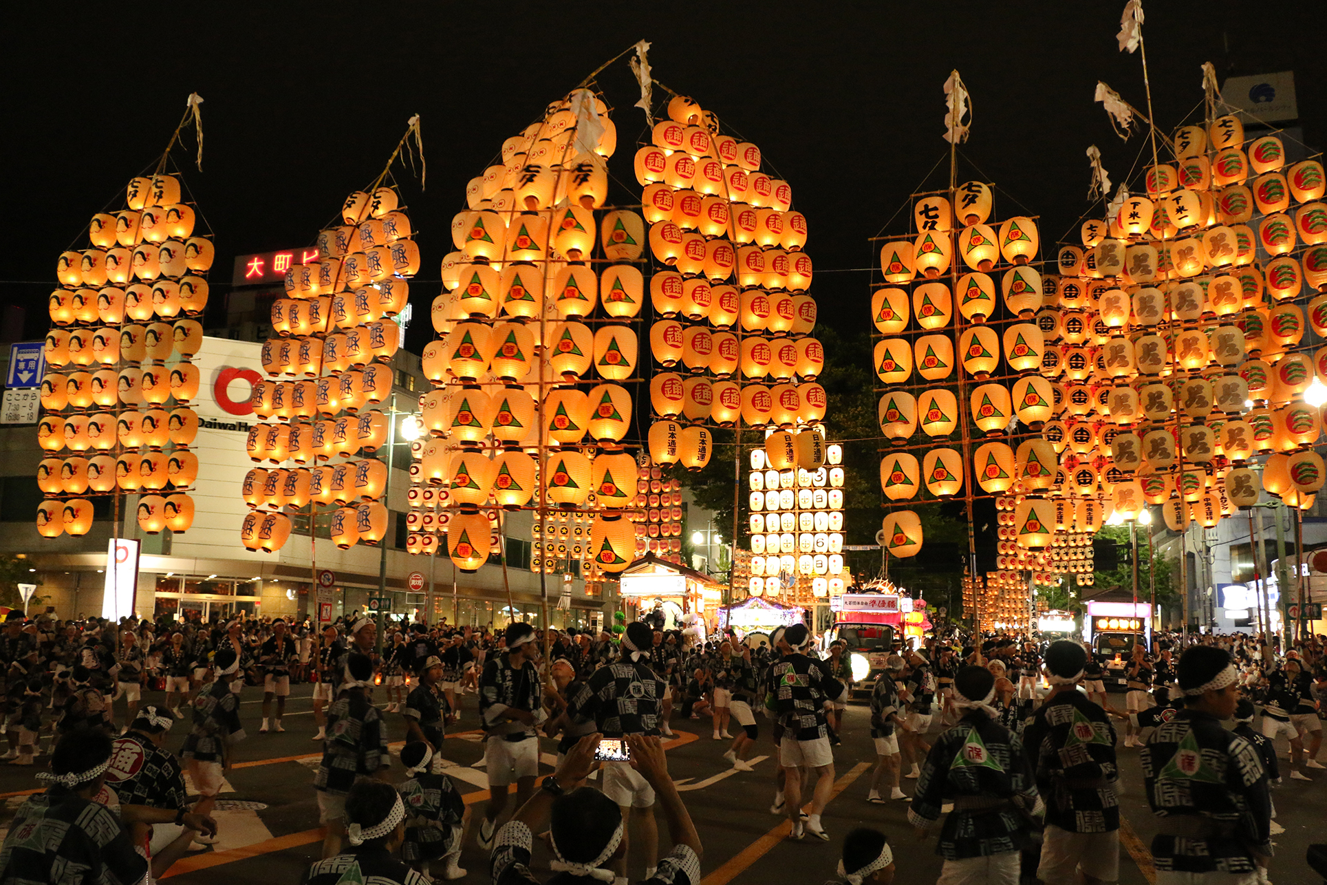 Towering lanterns light up the summer sky at Akita’s famous festival