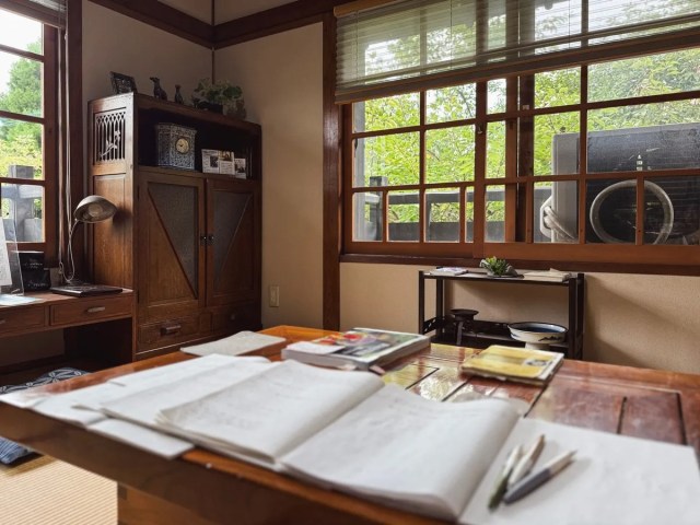 This quiet forest cafe in Japan lets you read all day in the house of a famous author